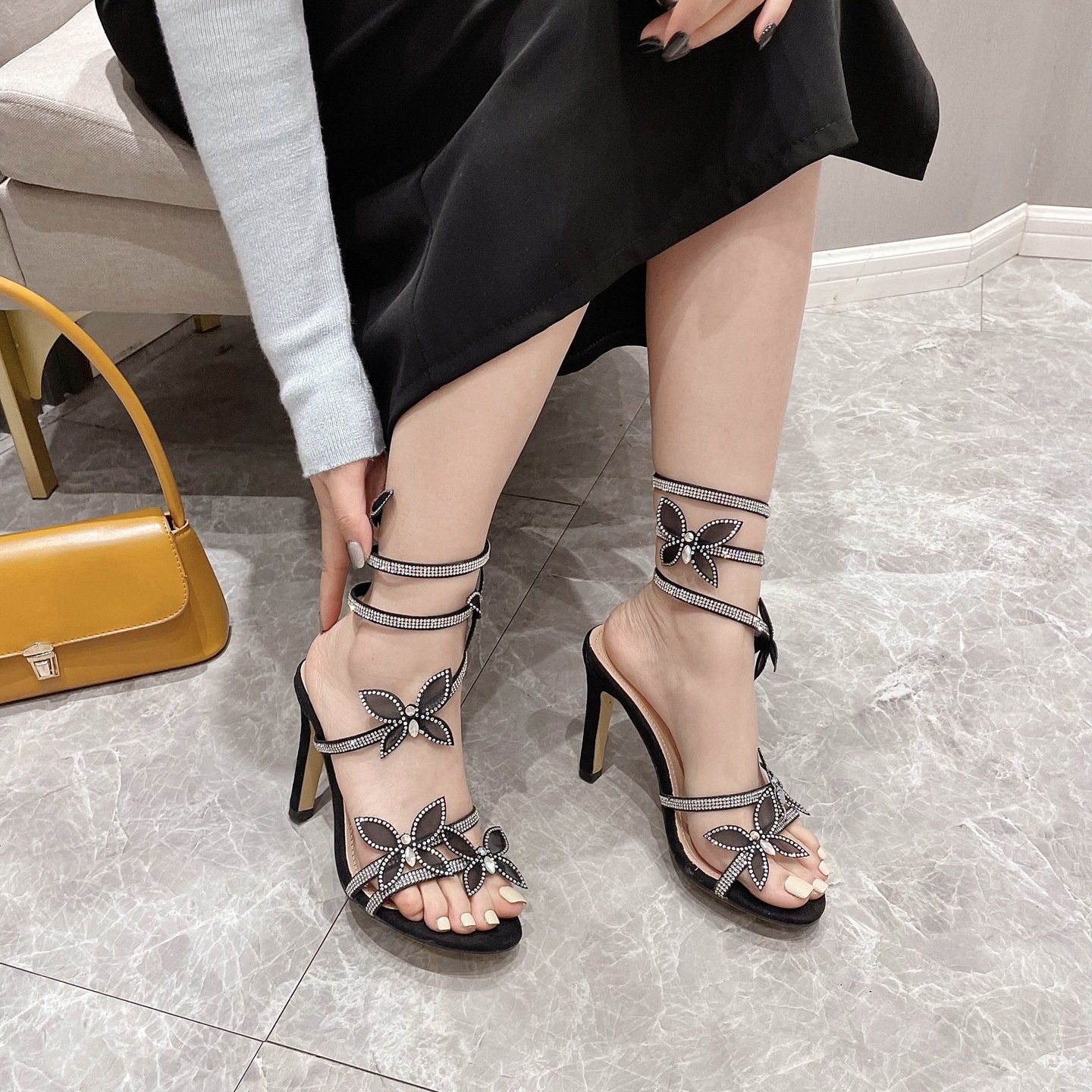 Rhinestone butterfly embellished snake stiletto sandals